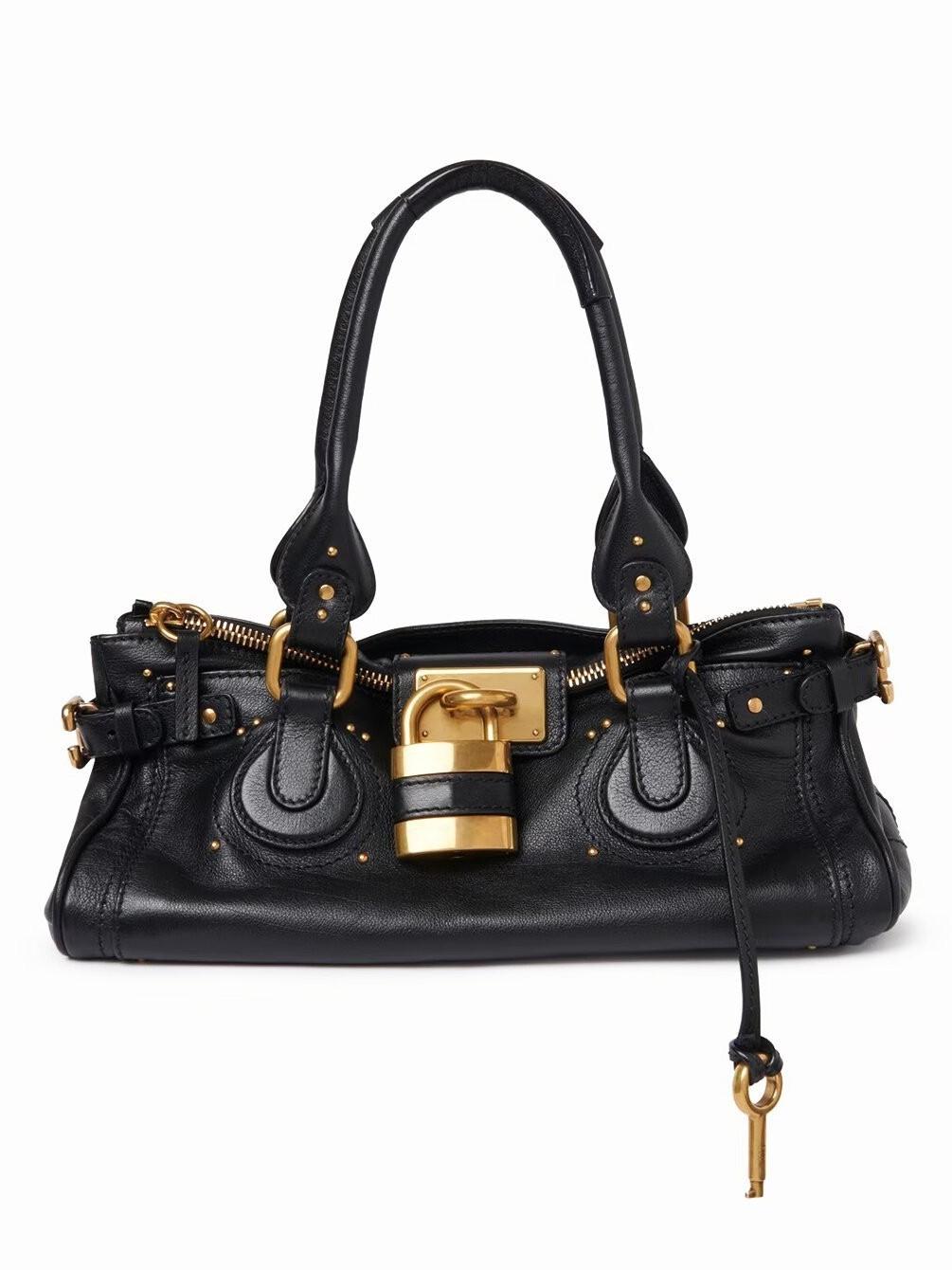 

2026 Нова Осінь/Зима Вінтажна Універсальна Сумка з Головою-Замком та Сумка-Подушка з Заклепками чорний