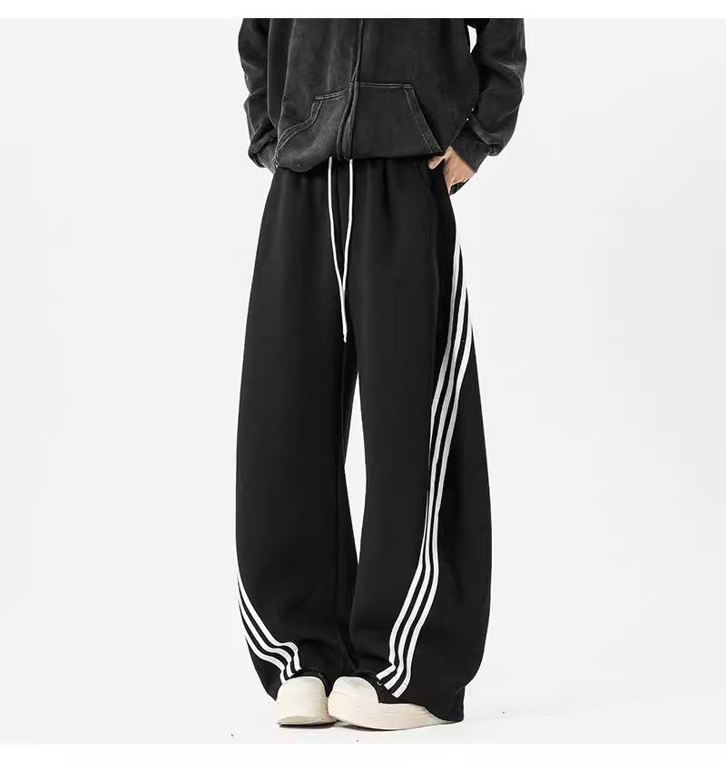 Pánské tmavě modré široké tepláky se třemi pruhy - Ležérní jarní high street trend