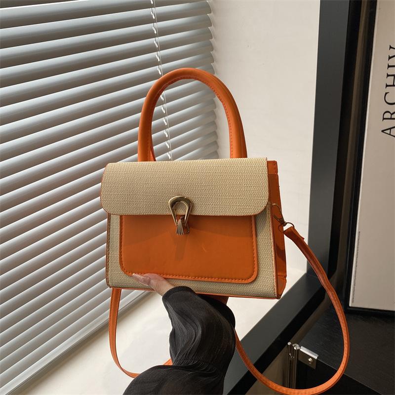 

Иноземный стиль вдавленный узор личи новая 2025 лето замок простой повседневный мессенджер плечевая портативная маленькая квадратная сумка женщина оранжевый