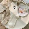 Dicke, bestickte Wollsocken für Damen im Winterstil