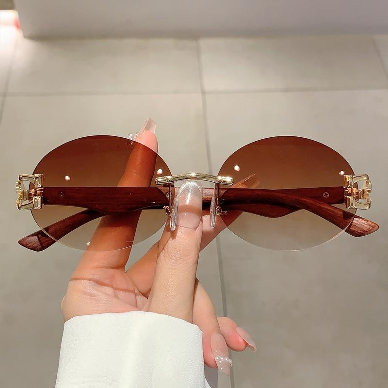 Luksusowa Marka Projektant Vintage Bezoprawkowe Owalne Okulary Przeciwsłoneczne Damskie Dla Mężczyzn Okulary Słoneczne Modne Punk Popularne Metalowe Lamparty Okulary