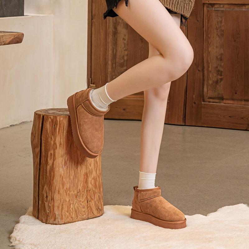 Leather snow boots winter new winter rain fur integrated thick-soled short boots piled and thickened warm women's shoes