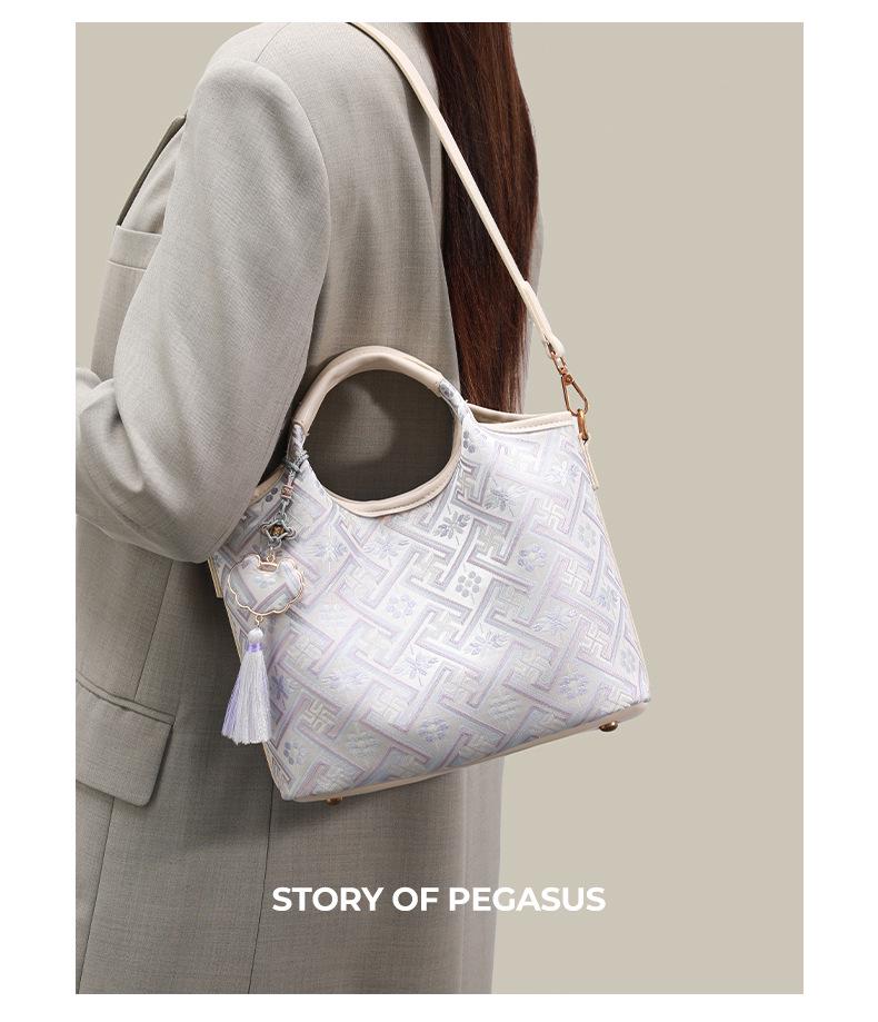 2026 Guangxi Zhuang Brocade Women's Heritage Bag: Versatile Handheld, Shoulder, and Crossbody