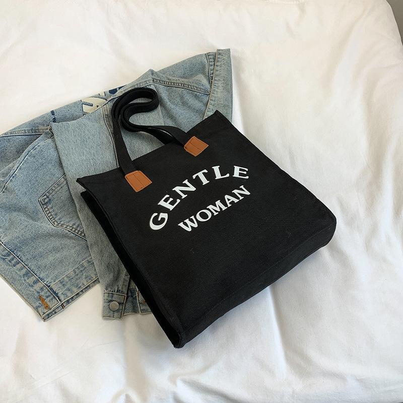 

Холщовая сумка большой вместимости женская 2025 осень и зима повседневная модная сумка через плечо с алфавитом сумка-тоут для учебы и работы чёрный