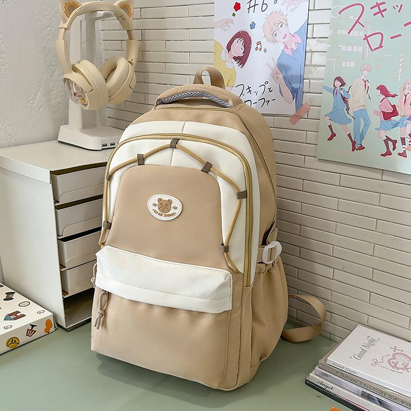 New Decompression Large Capacity Schoolbag Junior High School Girls and Senior High School Students Light Campus Backpack.