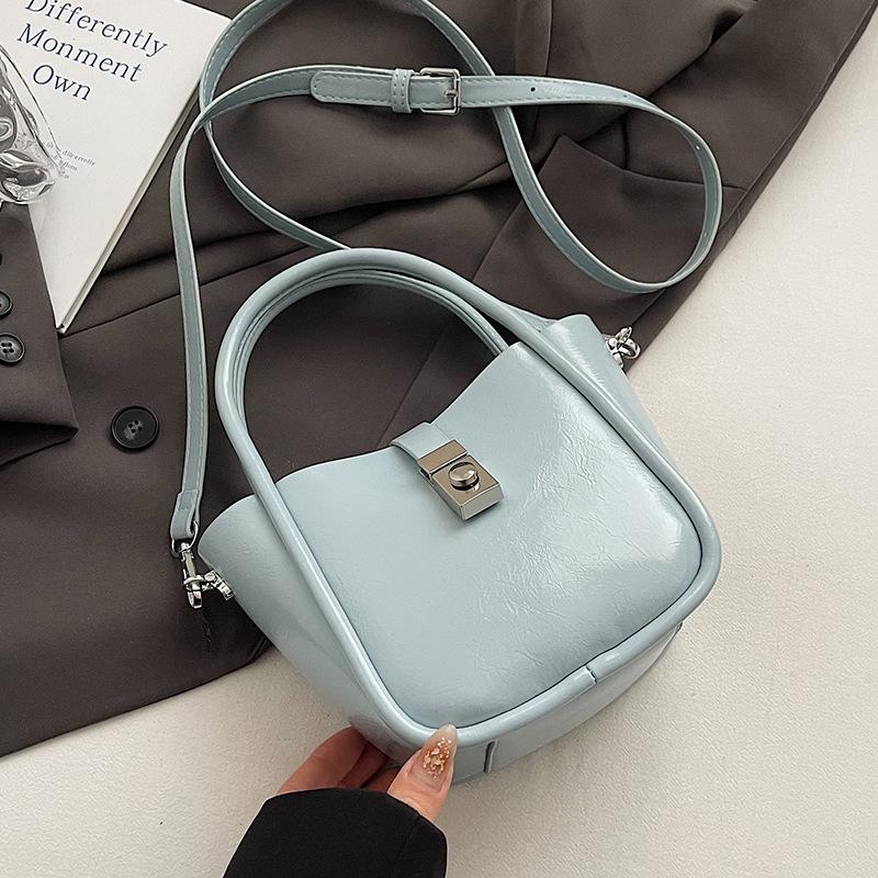 Spring and Summer New Casual Simple High-end Oil Wax Leather Portable Bucket Bag Korean Version Niche Design Solid Color Messenger Bag