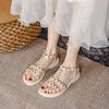 2025 summer new versatile flat-bottomed fairy style with skirt rivets Roman fashion Internet celebrity sandals women