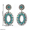 Retro Heavy-duty Hollowed-out Flower Turquoise Earrings for Women - Creative, Exaggerated, High-end Ear Jewelry.