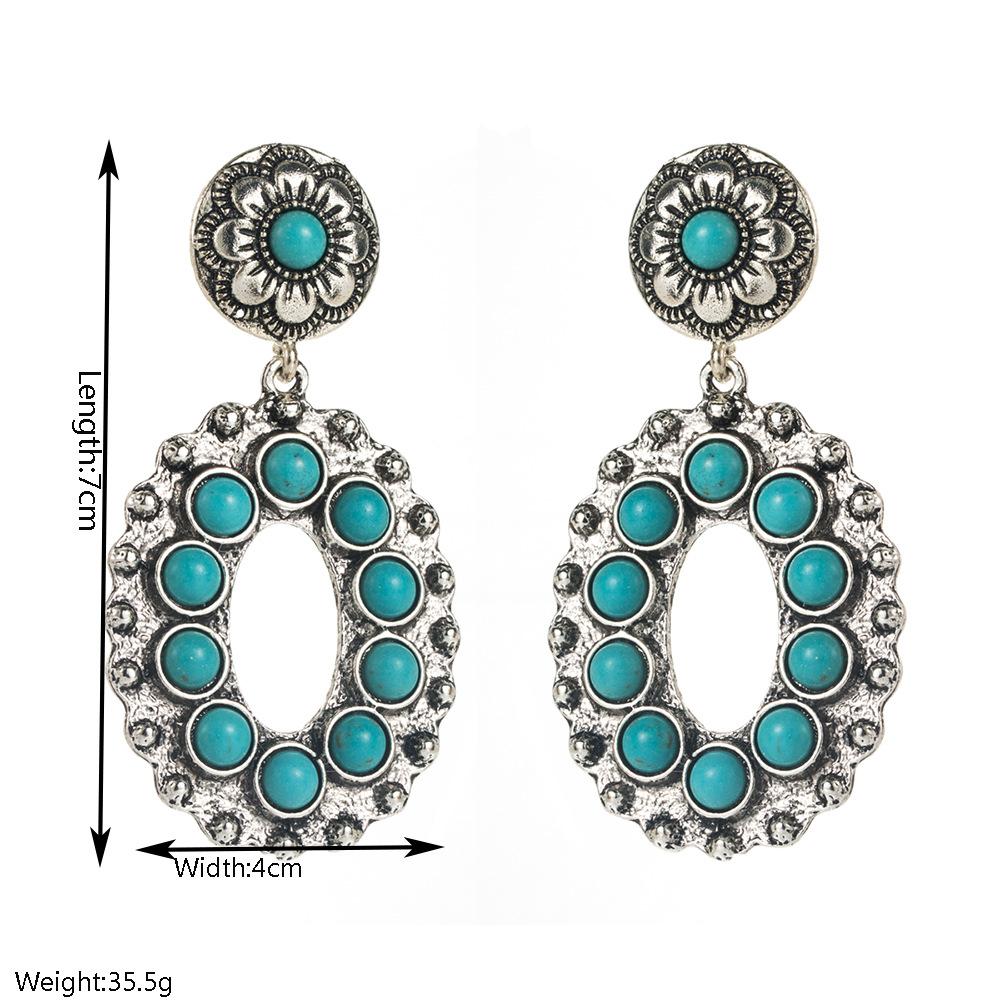 Retro Heavy-duty Hollowed-out Flower Turquoise Earrings for Women - Creative, Exaggerated, High-end Ear Jewelry.