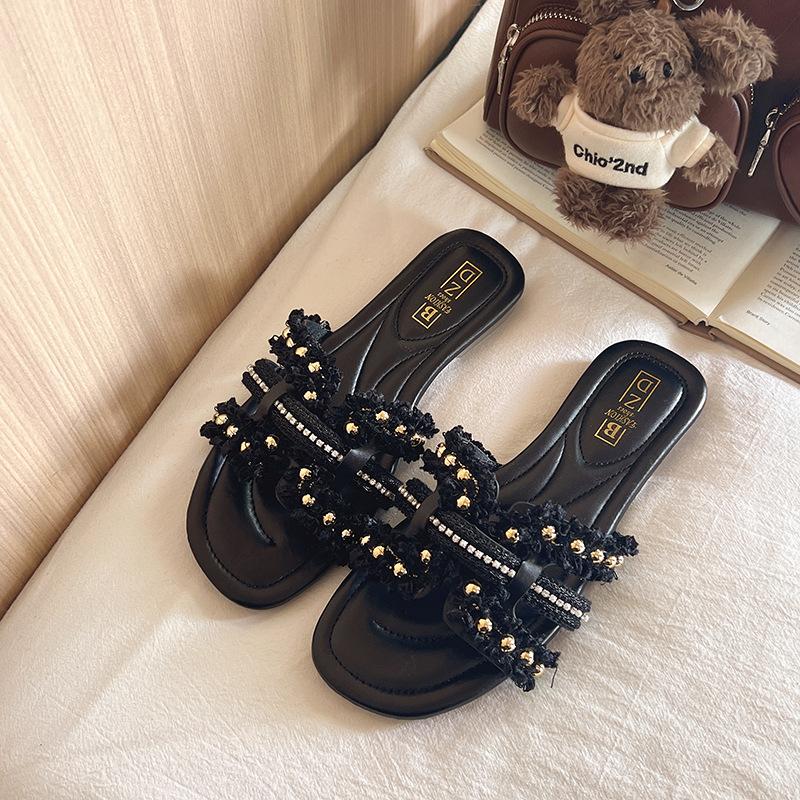 

Шлепанцы на плоской подошве для женской летней носки новые для морского отдыха пляжные шлепанцы на одно слово модные и удобные сандалии 40 чёрный