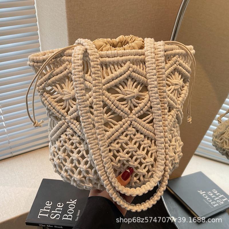 Literary and simple cotton thread shoulder woven bag women's 2025 new hollow niche handmade straw bag handbag women