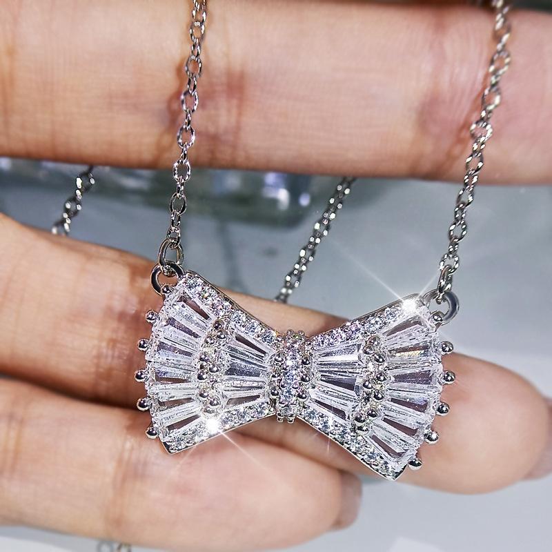 Korean Version Simple Bow Necklace Earrings Three Piece Set Platinum Plated Set with Zirconium Womens Fashion Accessories