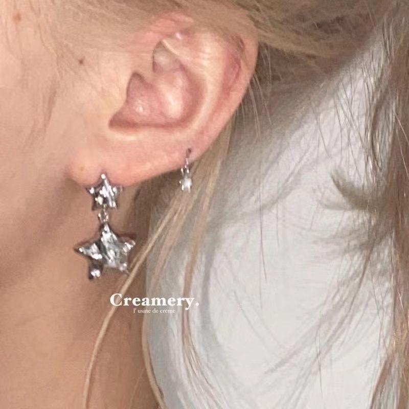 

European and American shining stars inlaid with zircon silver earrings femininity niche design cold wind stud earrings