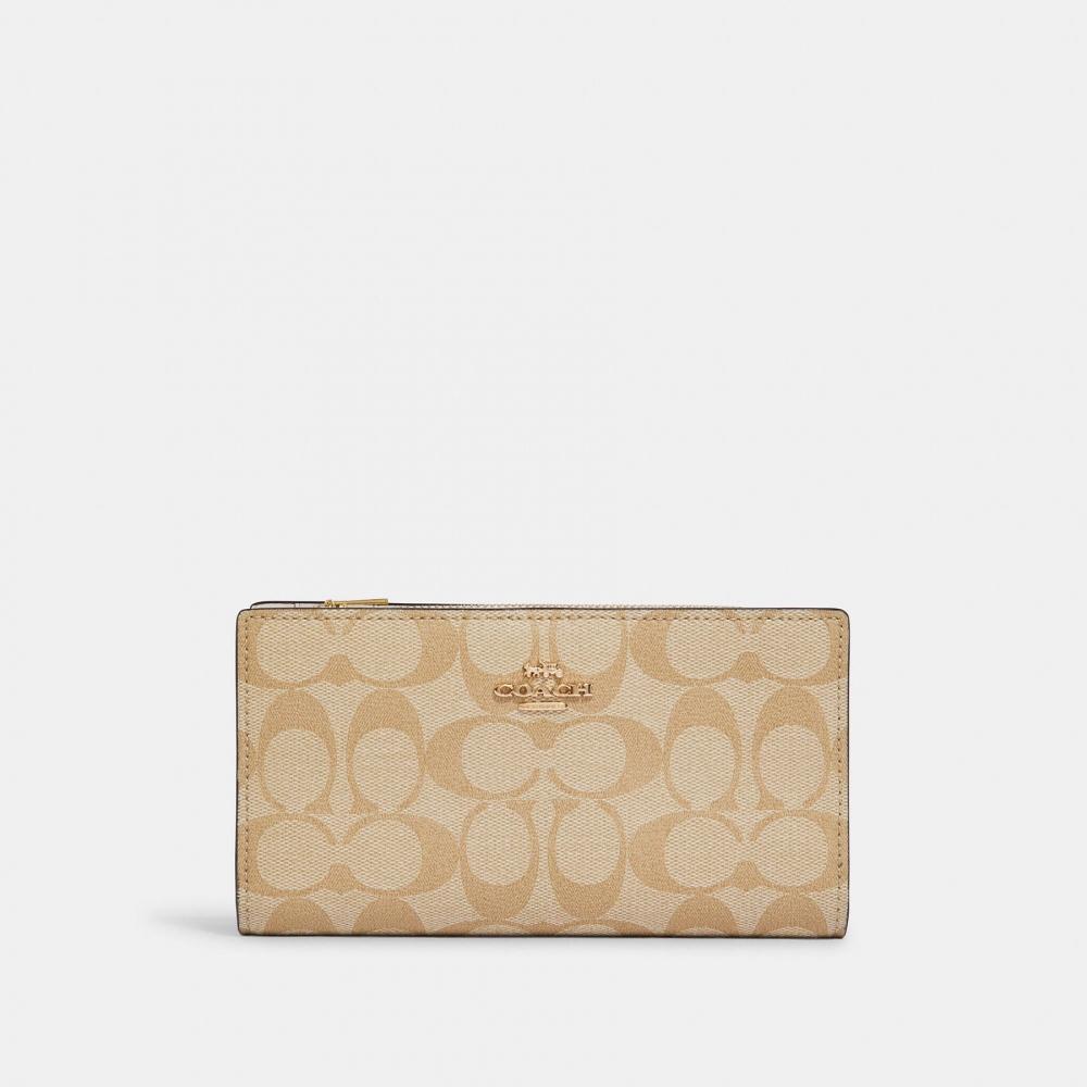 

Тонкий кошелек Coach из фирменной канвы на молнии