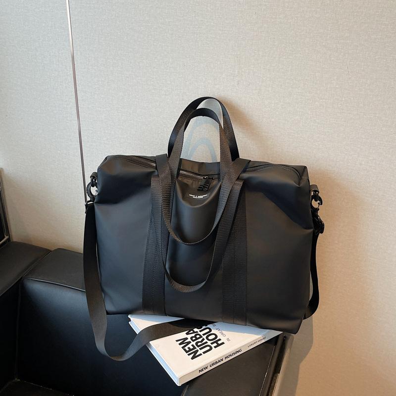 

Short-haul handbag women s large-capacity new business trip luggage bag cloth shoulder messenger commuter bag чорний