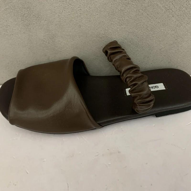 

Лето 2025 Новая Мода Женские Черные Уличные Шлепанцы Круглый Носок Плоский Передний Ремешок для Путешествий Сандалии из Натуральной Кожи Мода 36