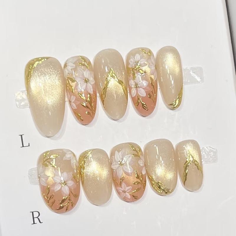 30 Cat Eye Gold Foil Almond-Shaped Nail Stickers with Colorful Floral Designs and Gradient Gold Accents
