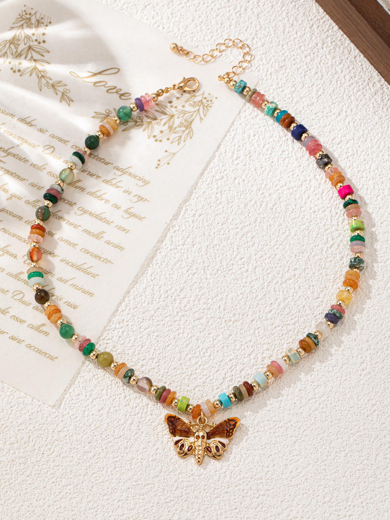 New self-developed new handmade colored stone hanging butterfly pendant necklace light luxury