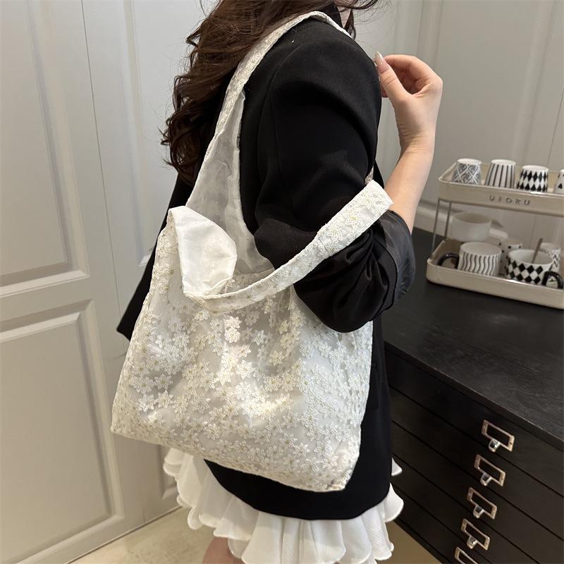 Small fresh lace flower canvas bag women's new large-capacity shoulder support bag commuter armpit bag