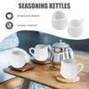 Luxshiny 6-Piece Ceramic Mini Milk Pitcher Set, also usable as a small sauce cup and coffee creamer, practical milk cup set for kitchen use.