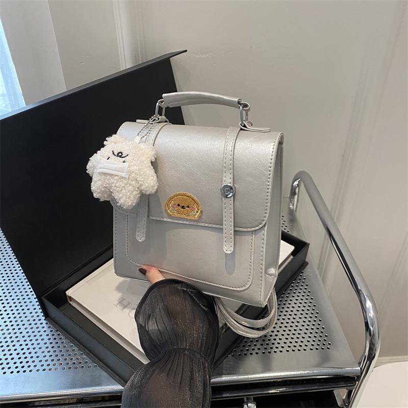 

Elegant White Pu Backpack For Women Versatile Stylish Casual Daypack Design Without Pendant срібний