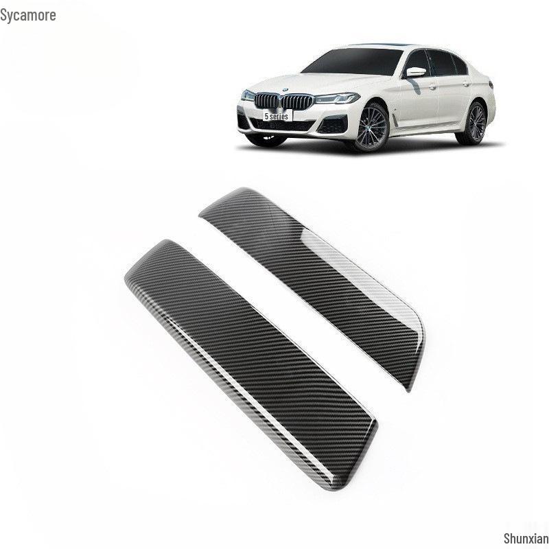 Carbon Fiber Interior Trim Set for BMW 5 Series: Center Console, Gear Shift, Multimedia Lift Panel, and Air Vents.