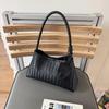 2025 Französische Nischen-Strick-Damen-Schulterhandtasche