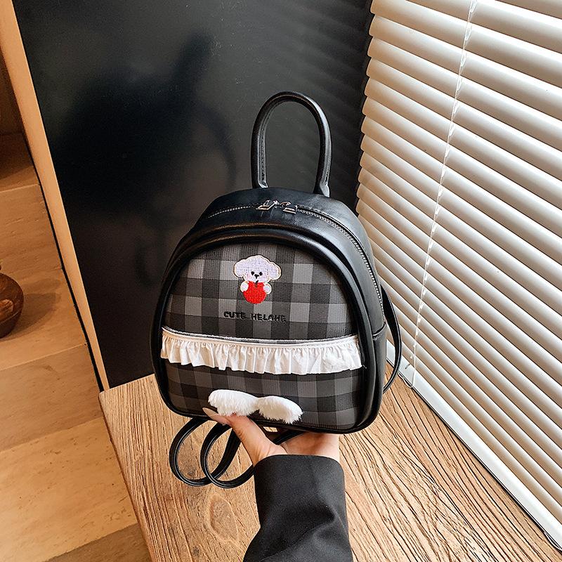 Neuer modischer vielseitiger kleiner Rucksack Damen High-End-Gefühl Nische Lässig Einfache tragbare Umhängetasche