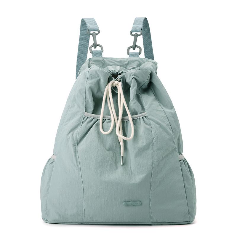 Niche design women's casual backpack college wind lightweight drawstring backpack