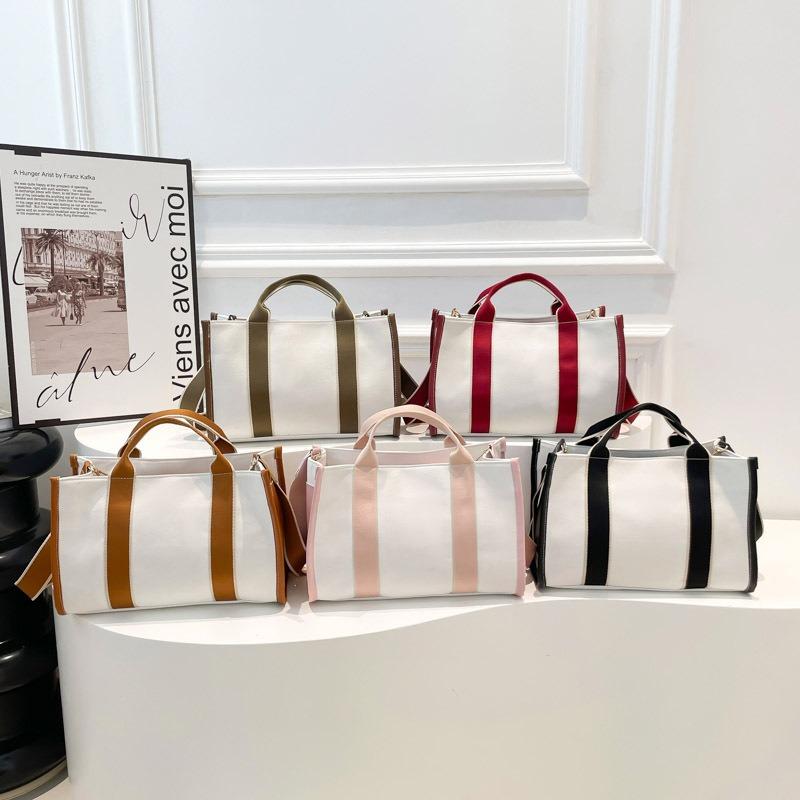 Spring new fashion, large-capacity portable canvas bag commuter shoulder bag contrasting colors