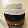 Knitted hat Flat top hat Women's autumn and winter versatile face small metal label retro simple casual hat