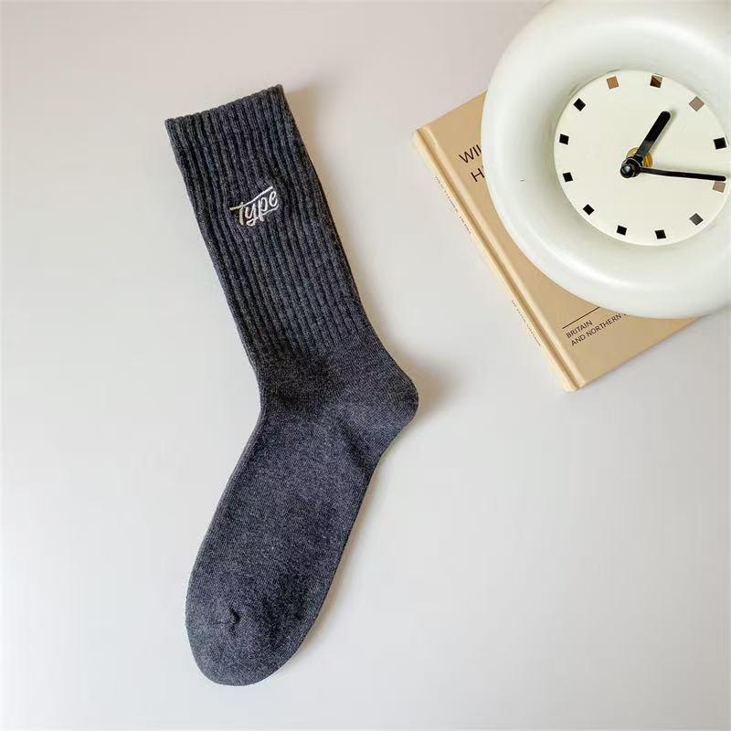 

Zhuji Youth Mid-Calf Sweat-Wicking Socks: Versatile, Trendy, All-Season Socks for Men with Letter Design One Size