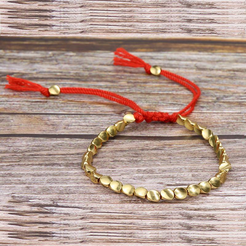 Handmade Woven Bracelet with Irregular Copper Beads and Creative Tassel Drawstring