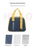 Stylish Oxford Cloth Thermal Lunch Bag - Trapezoidal, Large Capacity, Foldable, Handheld Bento Bag for Students.