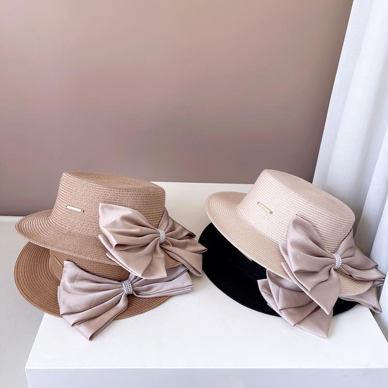 Ins Chic Summer Pearl Big Bowknot Grass Holiday Panama Lady Fedoras Cap Women Leisure Jazz Hat