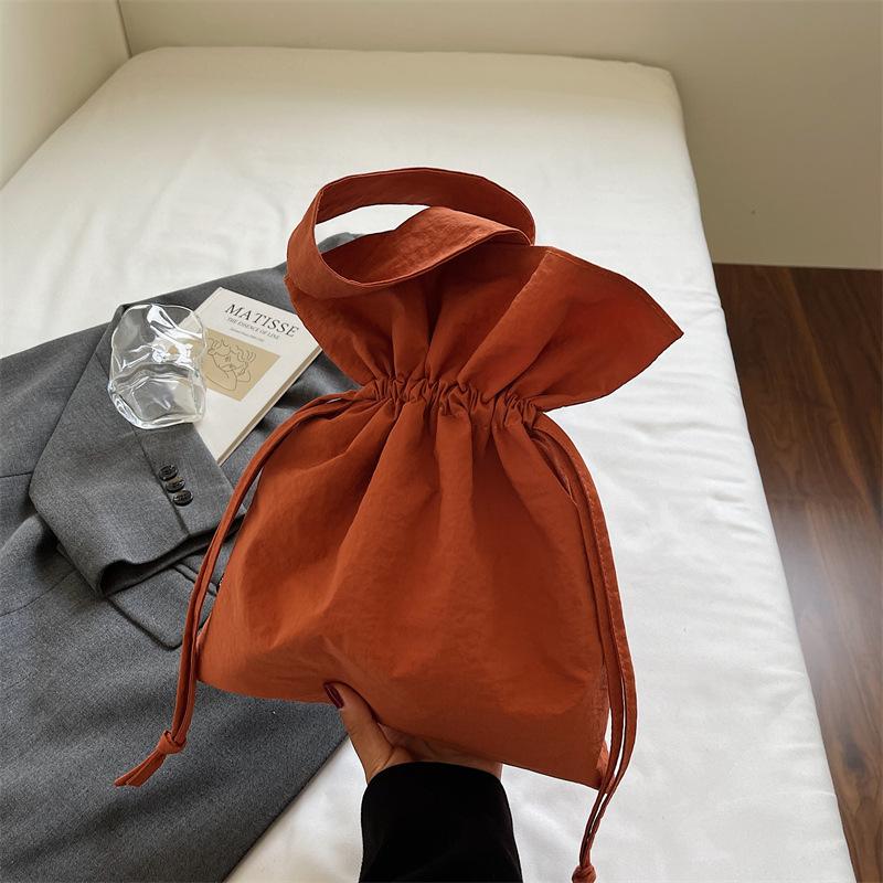 Korean version of girls bag large capacity ins style solid color personalized pleated canvas bag drawstring simple foreign style shoulder bag