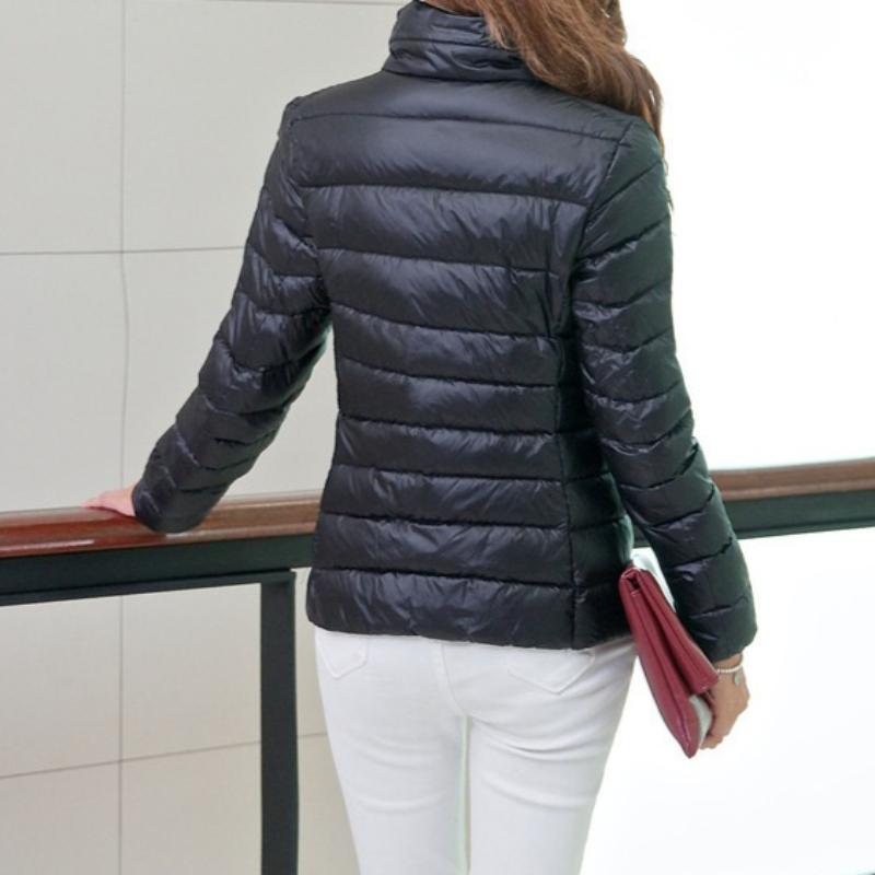 Women's Minimalist Solid-Color Down Jacket with Stand Collar Lightweight Style Plus Size Available