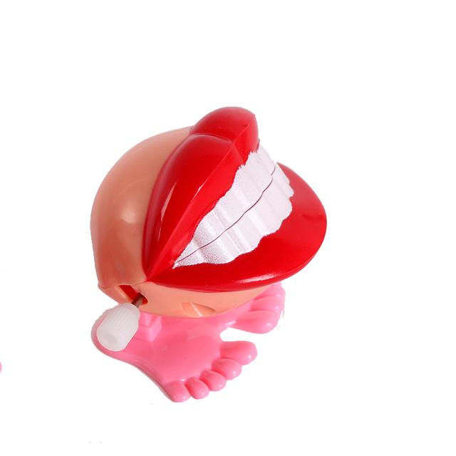 

1 шт. Заводная игрушка Верхняя цепь Прыгающая зубастая игрушка Дети Прыгают зубы Бегущая заводная пружинная игрушка OneSize