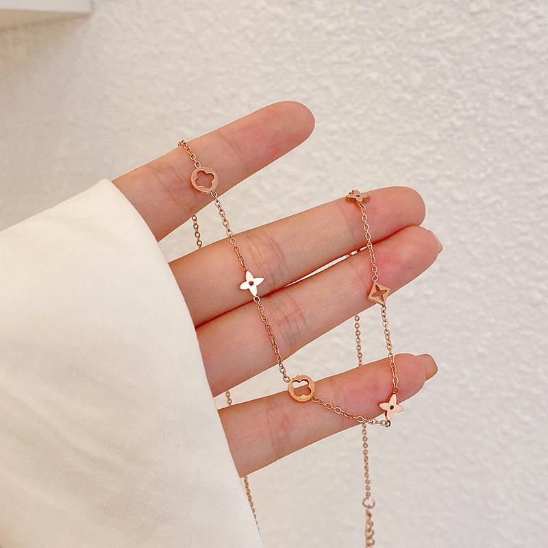 Hollow Four-Leaf Clover Necklace: Titanium Steel Clavicle Chain for Women - Elegant, Simple Design