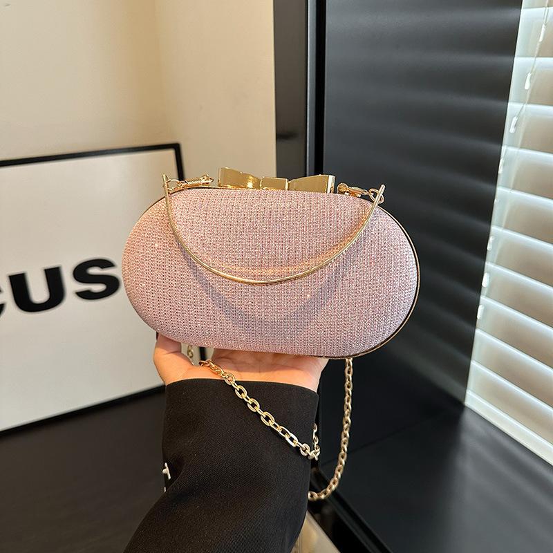Pochette da sera dorata Borse da donna Borse da sposa lucide Pochette da sposa con fiocco in metallo Borsa a tracolla con catena