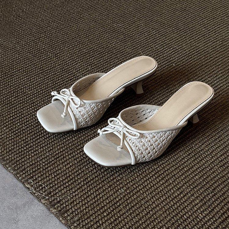 

Soft leather version~ holiday style woven hollow sandals women s versatile bow one-word drag open-toed square head high heels summer 40
