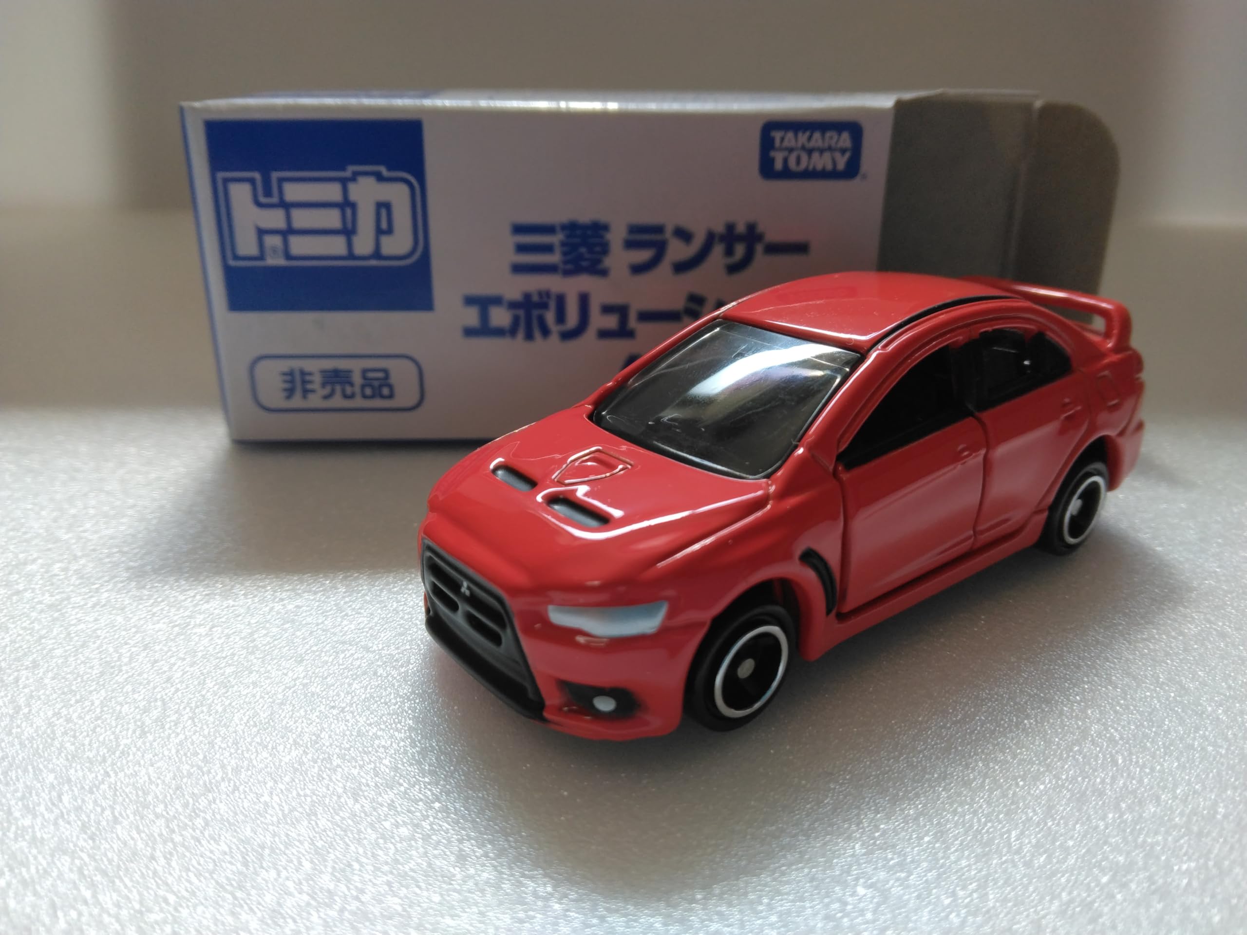 

Tomica not for sale Mitsubishi Lancer Evolution X 1/64 scale die-cast minicar (red)