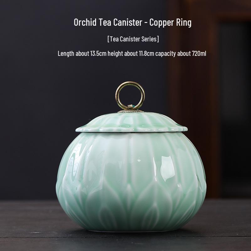 Celadon Ceramic Tea Canister: Large Half-Pound Capacity Storage for Green or Black Tea - Porcelain Sealing Jar with Printed Design.