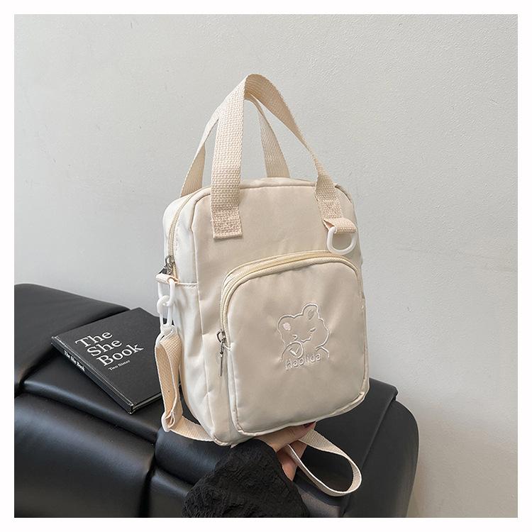 High-value cute cartoon bear messenger bag, versatile for teenagers and girls, small square bag for going out to work, commuting mobile phone bag