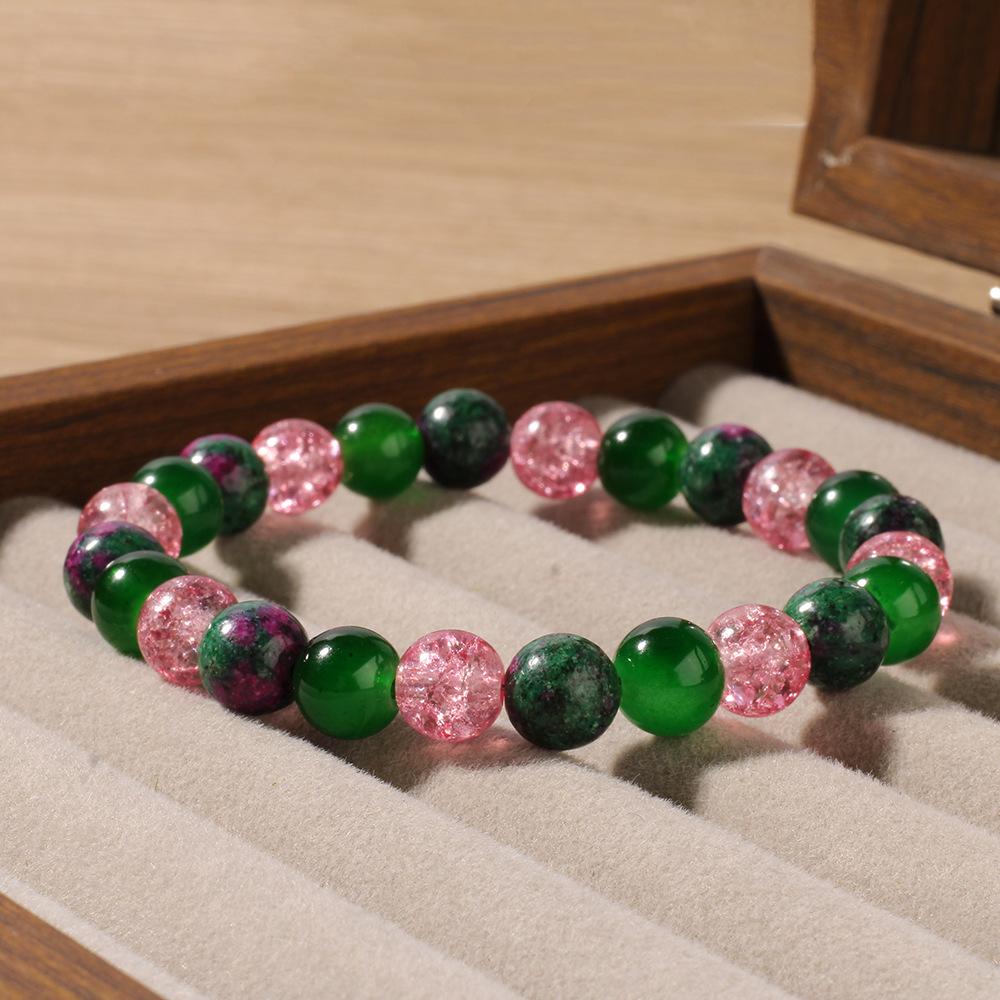 

High end Y2K neutral style crystal bracelet handmade by women, featuring red and green precious bead bracelets