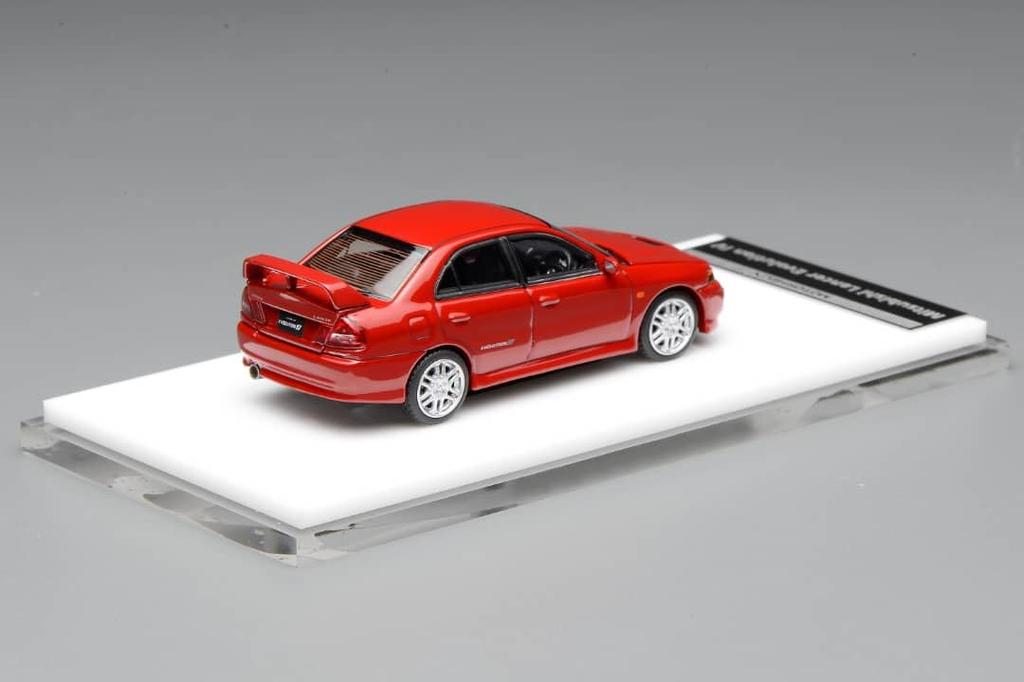 FREESTYLE MOTORHELIX Mitsubishi Lancer Evolution IV Palma Red Finished Model M64008 1/64