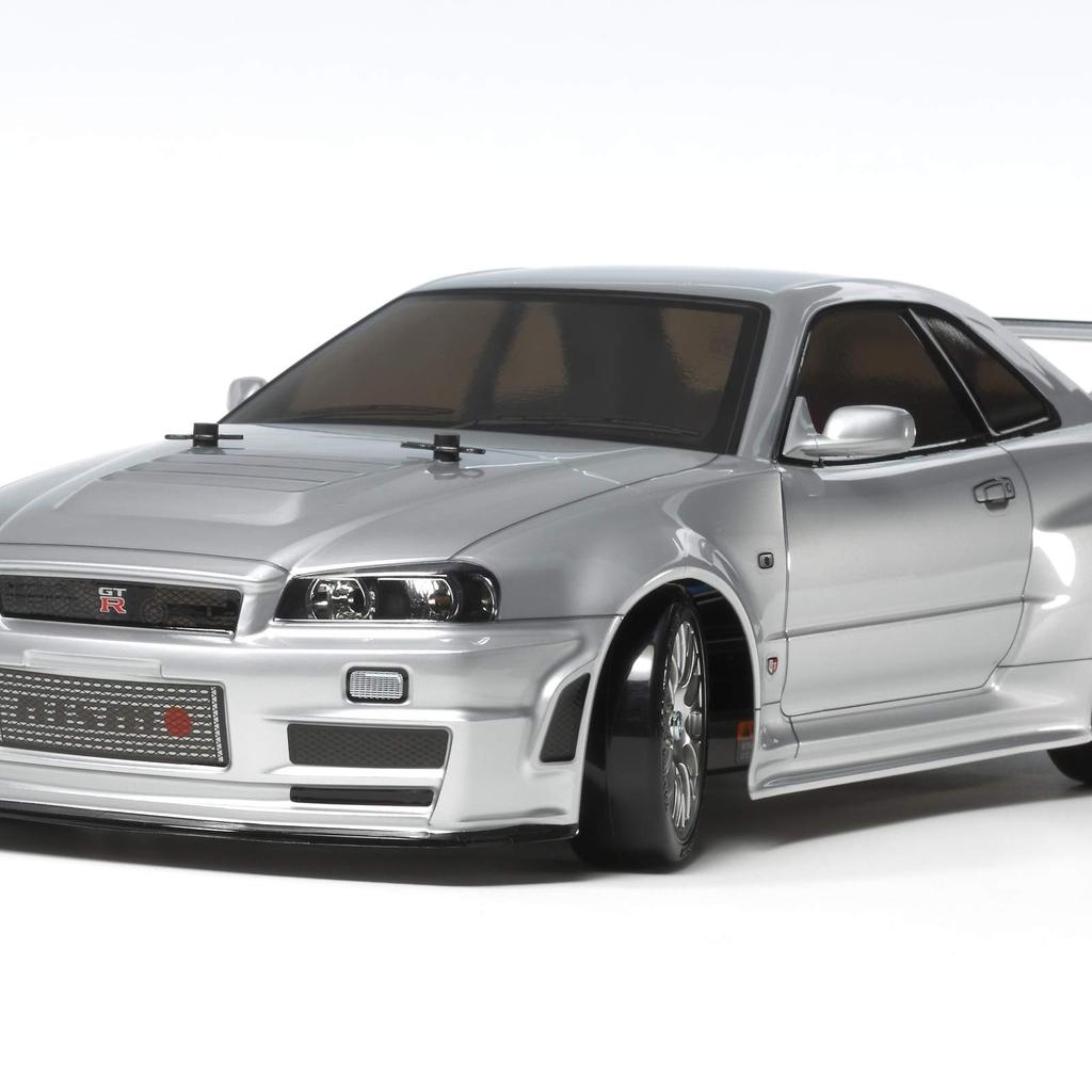 TAMIYA mužské elektrické RC auto řady Nismo R34 Drift spec 58605 1/10 No.605 GT-R Z-tune (Podvozek TT-02D) na cestě