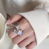 Influencer Starry Moonstone Ring with Iridescent Diamond Star Design