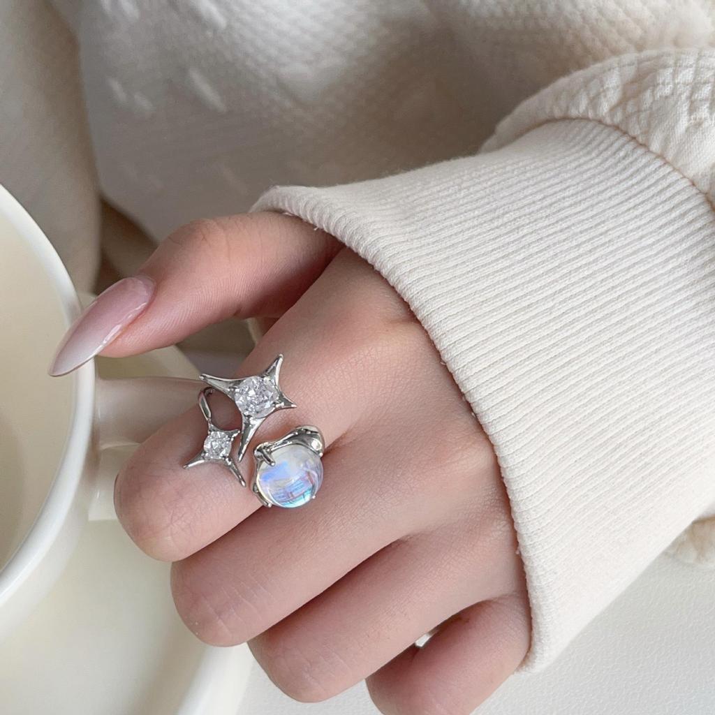 Influencer Starry Moonstone Ring with Iridescent Diamond Star Design