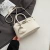 Simple temperament hand bag women's spring new niche fashion messenger bag commuter shoulder bag